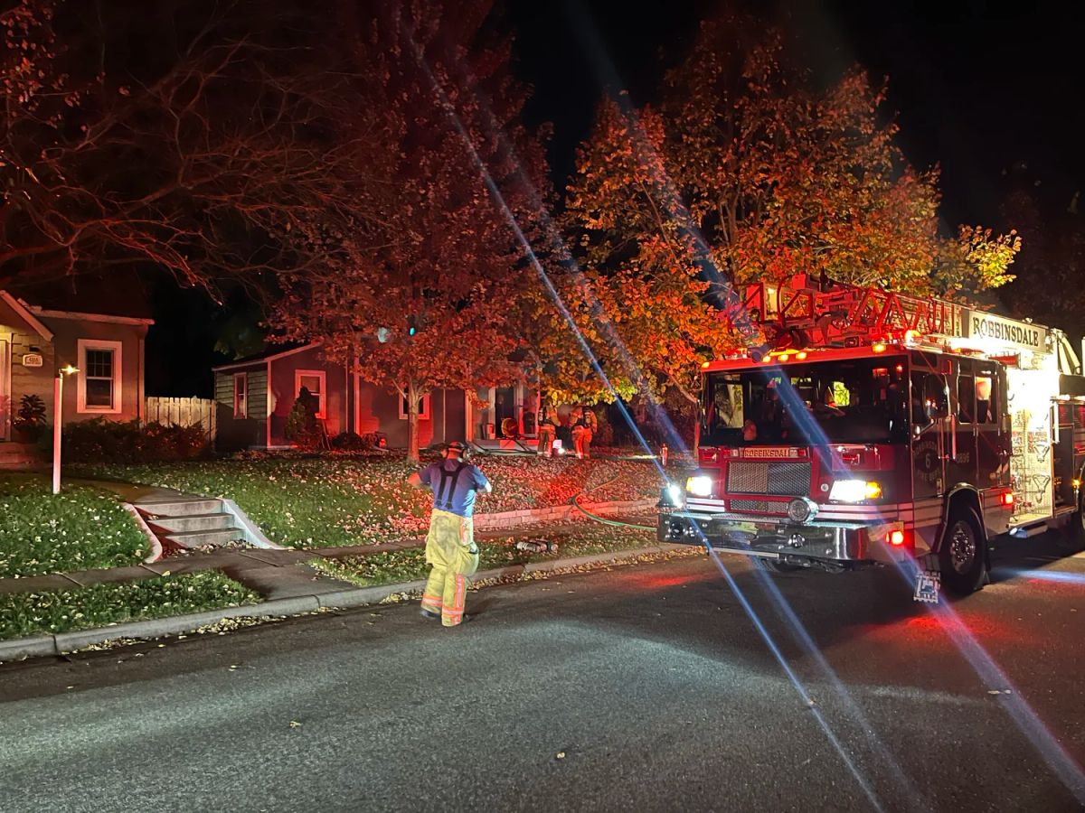 Robbinsdale Officers Rescue 2 Dogs from House Fire
